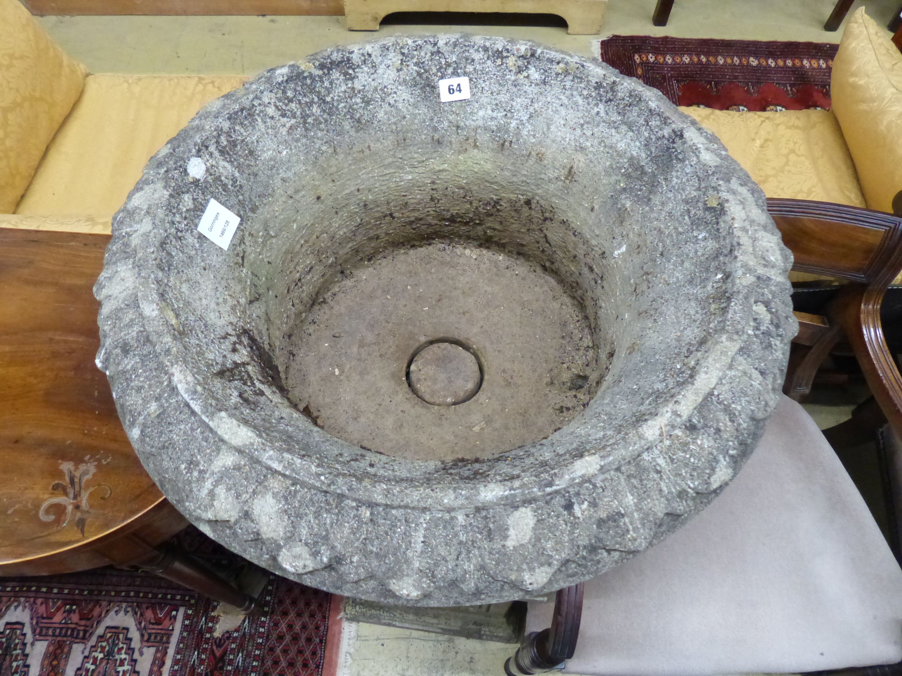 A reconstituted stone Campana garden urn on associated plinth base, Diam.60cm H.106cm